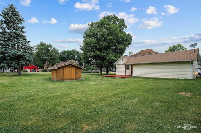 92 Maple St, Sugar Grove, IL 60554 - view of grassy yard with a storage shed and a wooden deck