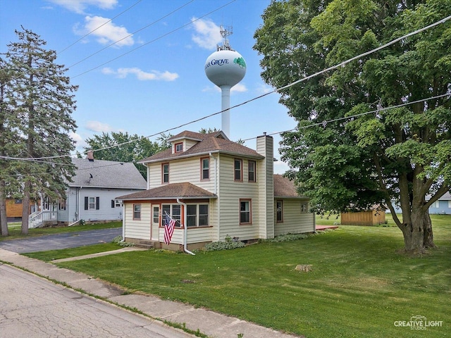 92 Maple St, Sugar Grove, IL 60554 - view of front of property with a chimney, a front lawn, roof with shingles, and entry steps