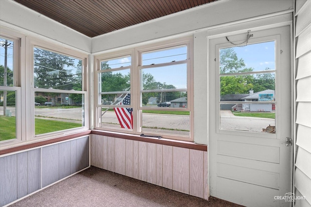 92 Maple St, Sugar Grove, IL 60554 - unfurnished sunroom featuring carpet and wood walls