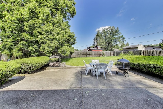 76 Brook Ln, Lindenhurst, IL 60046 - fenced backyard with outdoor dining area and a patio area