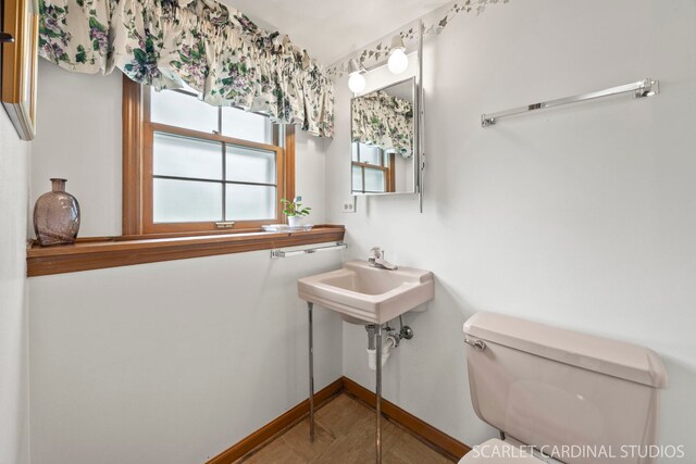 718 Liberty Ln, Lombard, IL 60148 - half bath featuring toilet and baseboards