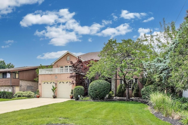 1206 Lathrop Ave, River Forest, IL 60305 - view of front facade featuring concrete driveway, a front lawn, a garage, and brick siding