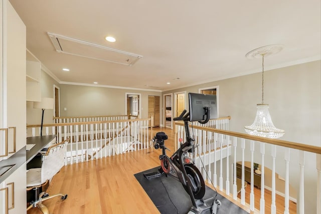 1206 Lathrop Ave, River Forest, IL 60305 - workout area with attic access, wood finished floors, crown molding, recessed lighting, and a chandelier