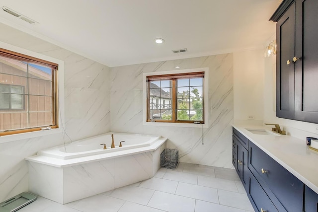 1206 Lathrop Ave, River Forest, IL 60305 - bathroom with vanity, a garden tub, plenty of natural light, tile patterned floors, and crown molding