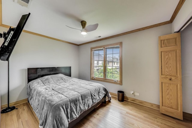 1206 Lathrop Ave, River Forest, IL 60305 - bedroom with ornamental molding, wood-type flooring, and ceiling fan