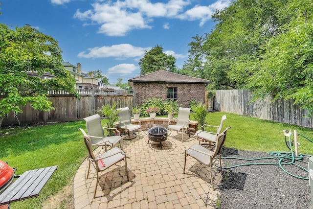 1206 Lathrop Ave, River Forest, IL 60305 - fenced backyard with a fire pit and a patio