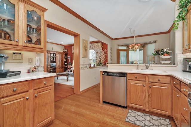 20910 W Blossom Ln, Plainfield, IL 60544 - kitchen featuring dishwasher, a chandelier, crown molding, light wood-style flooring, and a peninsula