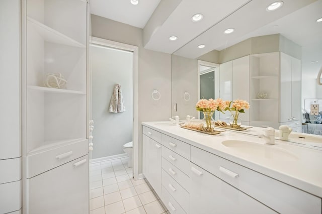 2416 Birchwood Ln, Wilmette, IL 60091 - bathroom featuring double vanity, tile patterned floors, and recessed lighting