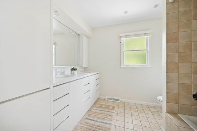 2416 Birchwood Ln, Wilmette, IL 60091 - bathroom featuring double vanity, tiled bath, tile patterned flooring, and a shower