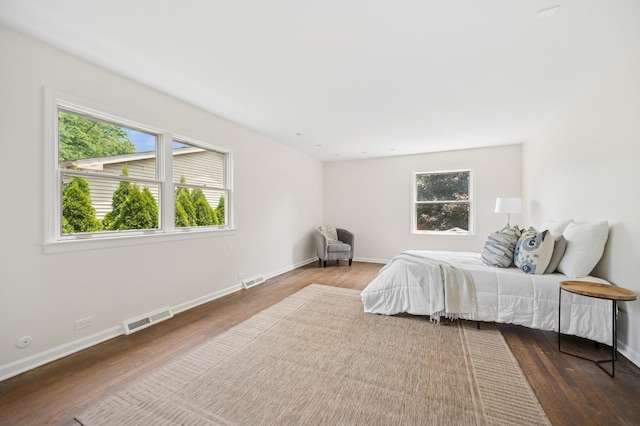 2416 Birchwood Ln, Wilmette, IL 60091 - bedroom featuring multiple windows and wood finished floors
