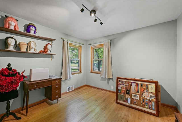 1704 Chevy Chase Dr, Champaign, IL 61821 - office space with wood-type flooring and track lighting