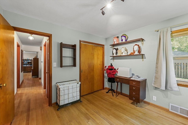 1704 Chevy Chase Dr, Champaign, IL 61821 - office space featuring light wood finished floors and track lighting