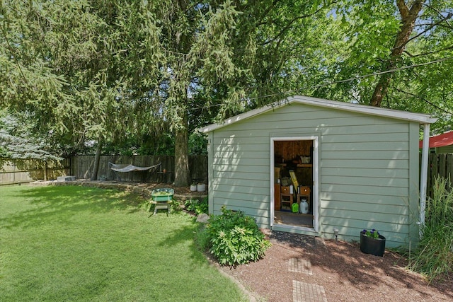 1704 Chevy Chase Dr, Champaign, IL 61821 - view of shed with a fenced backyard
