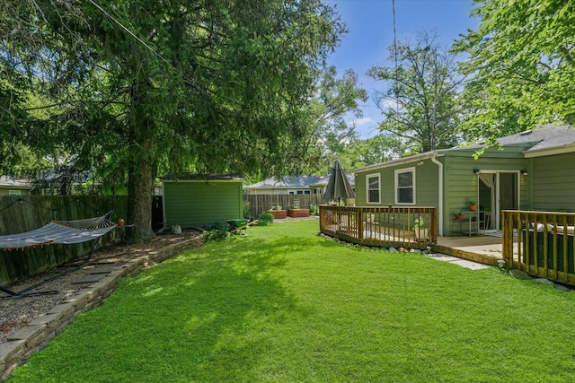 1704 Chevy Chase Dr, Champaign, IL 61821 - view of yard with a wooden deck and a shed