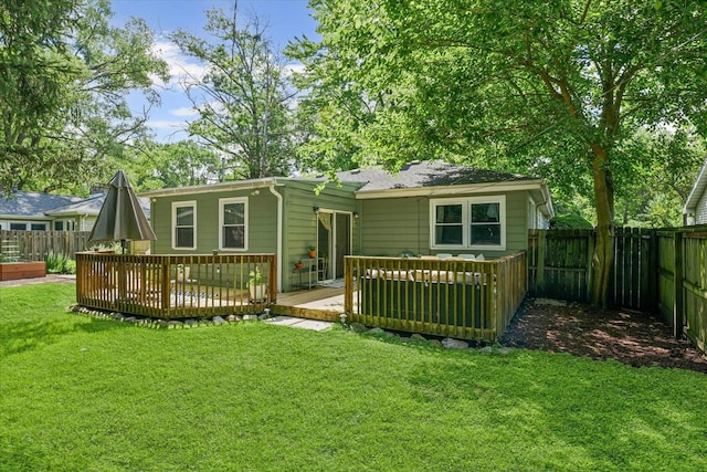 1704 Chevy Chase Dr, Champaign, IL 61821 - rear view of property featuring a fenced backyard and a wooden deck