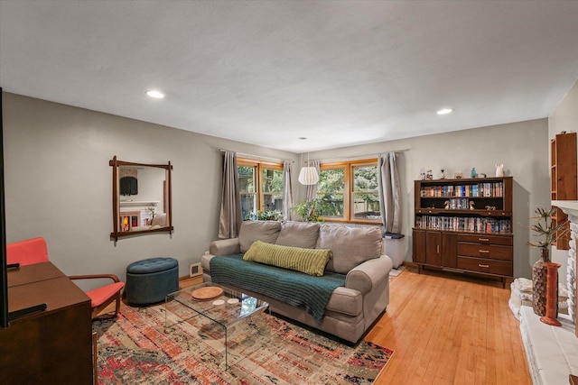 1704 Chevy Chase Dr, Champaign, IL 61821 - living room with light wood-style flooring and recessed lighting