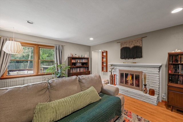 1704 Chevy Chase Dr, Champaign, IL 61821 - living room with wood finished floors, a fireplace, and recessed lighting