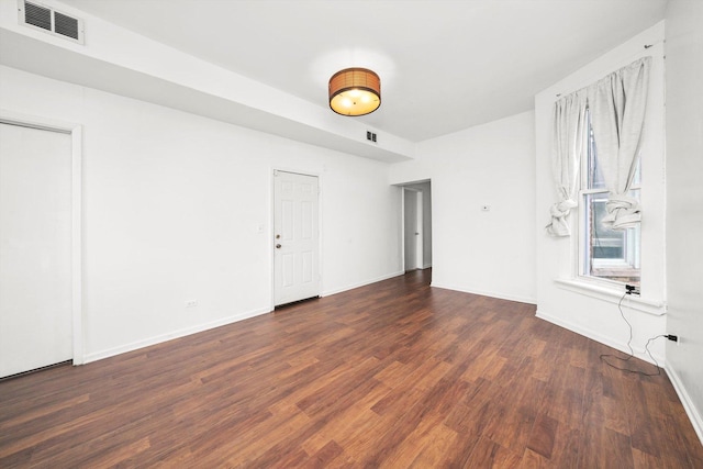 5522 S Wells St, Chicago, IL 60621 - empty room featuring wood finished floors and baseboards
