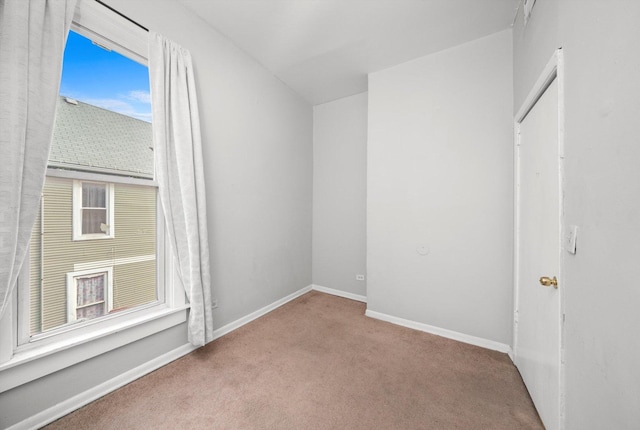 5522 S Wells St, Chicago, IL 60621 - carpeted empty room featuring baseboards