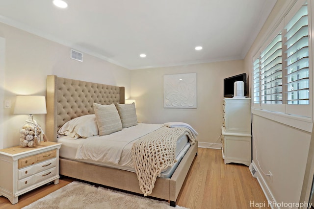 813 E Gardenia Ln, Palatine, IL 60074 - bedroom with light wood-style flooring, recessed lighting, and crown molding