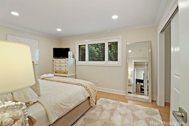 813 E Gardenia Ln, Palatine, IL 60074 - bedroom with wood finished floors, crown molding, recessed lighting, and a closet