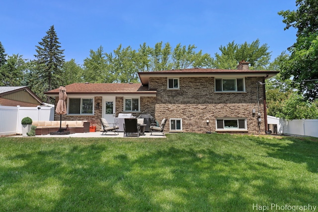 813 E Gardenia Ln, Palatine, IL 60074 - rear view of property with outdoor lounge area, a chimney, a patio, a fenced backyard, and brick siding
