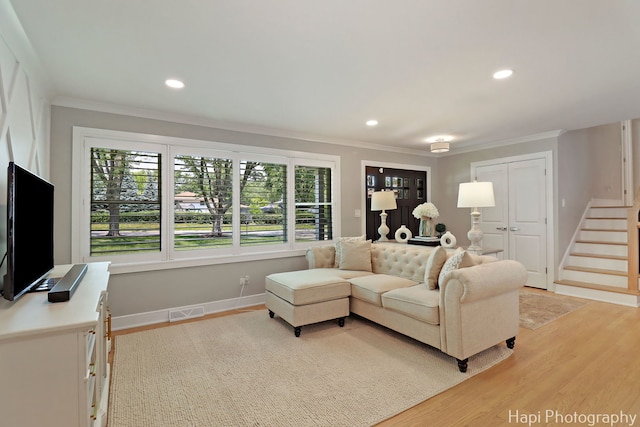 813 E Gardenia Ln, Palatine, IL 60074 - living room with crown molding, light wood-type flooring, stairs, and recessed lighting