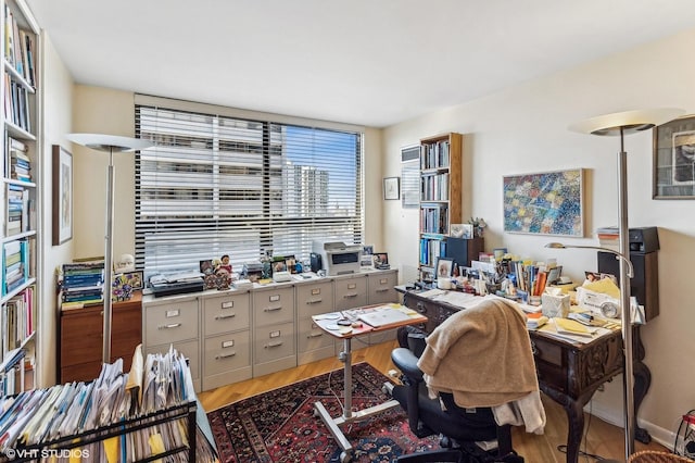 1410 N State Pkwy Unit 18B, Chicago, IL 60610 - home office with light wood-style floors