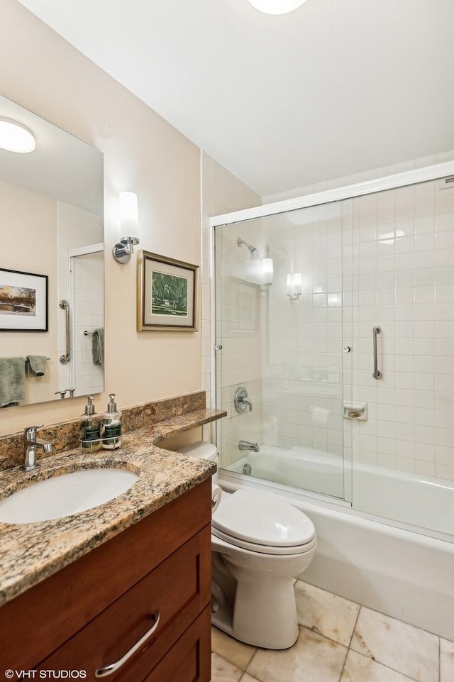 1410 N State Pkwy Unit 18B, Chicago, IL 60610 - bathroom with vanity, shower / bath combination with glass door, and tile patterned flooring
