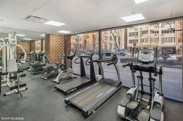 1410 N State Pkwy Unit 18B, Chicago, IL 60610 - workout area featuring a paneled ceiling and healthy amount of natural light