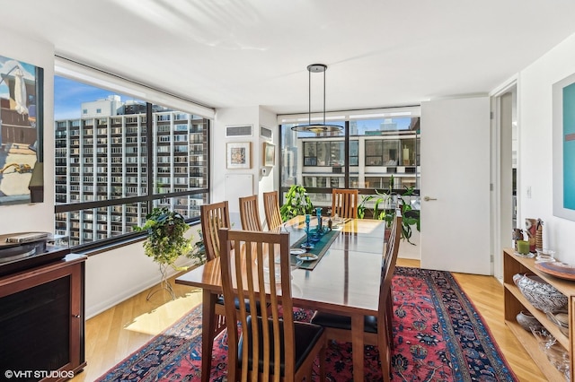 1410 N State Pkwy Unit 18B, Chicago, IL 60610 - dining room with wood finished floors