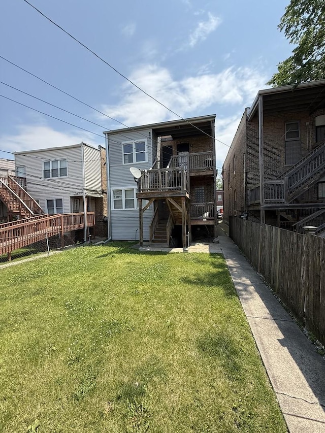7544 S Sangamon St, Chicago, IL 60620 - back of house with stairway and a wooden deck