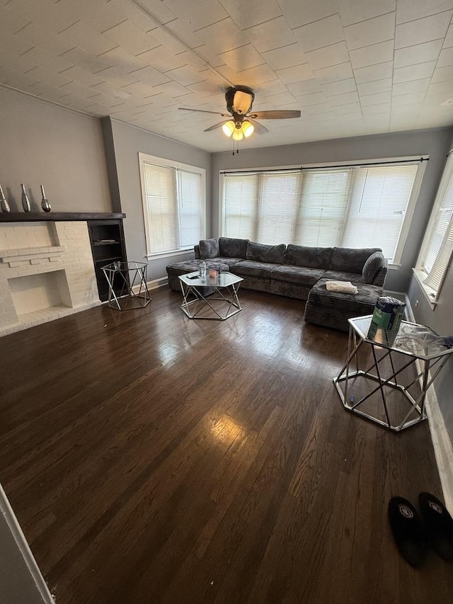 7544 S Sangamon St, Chicago, IL 60620 - living area featuring ceiling fan, dark wood-style floors, and a fireplace