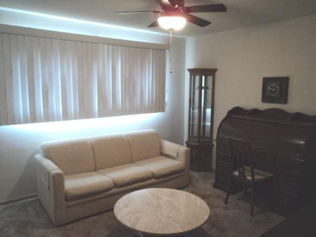 7341 W 56th Pl, Summit, IL 60501 - living area featuring ceiling fan