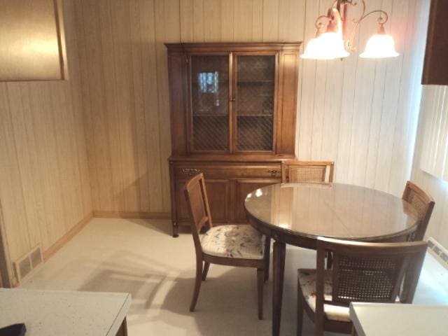 7341 W 56th Pl, Summit, IL 60501 - dining area featuring wooden walls