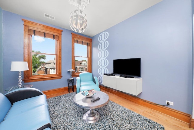 2347 Clarence Ave, Berwyn, IL 60402 - living room with wood finished floors and a chandelier