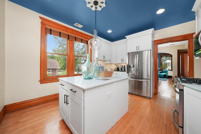 2347 Clarence Ave, Berwyn, IL 60402 - kitchen featuring stainless steel appliances, light wood-style floors, white cabinetry, pendant lighting, and recessed lighting