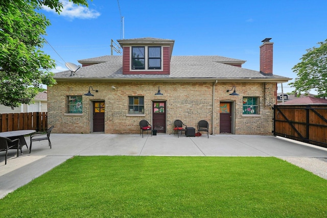 2347 Clarence Ave, Berwyn, IL 60402 - rear view of property featuring a patio, a chimney, brick siding, and a shingled roof