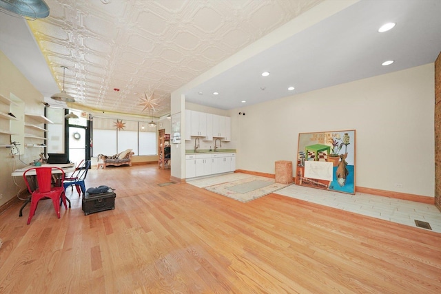 2347 Clarence Ave, Berwyn, IL 60402 - workout area with light wood-style flooring, recessed lighting, and an ornate ceiling