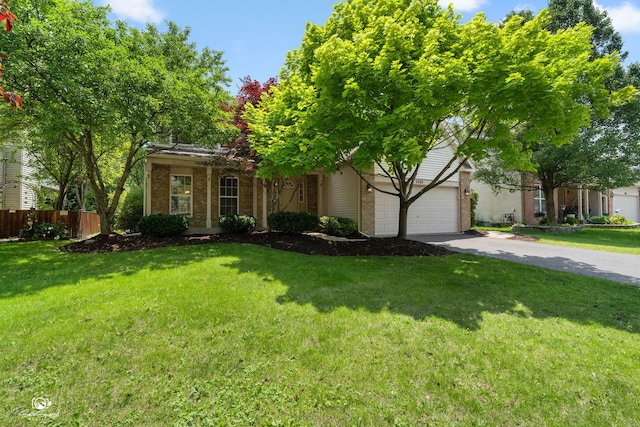 2008 Crosswind Dr, Plainfield, IL 60586 - view of property hidden behind natural elements with brick siding, driveway, and a garage