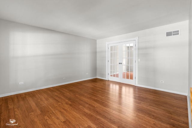 2008 Crosswind Dr, Plainfield, IL 60586 - spare room featuring french doors and wood finished floors