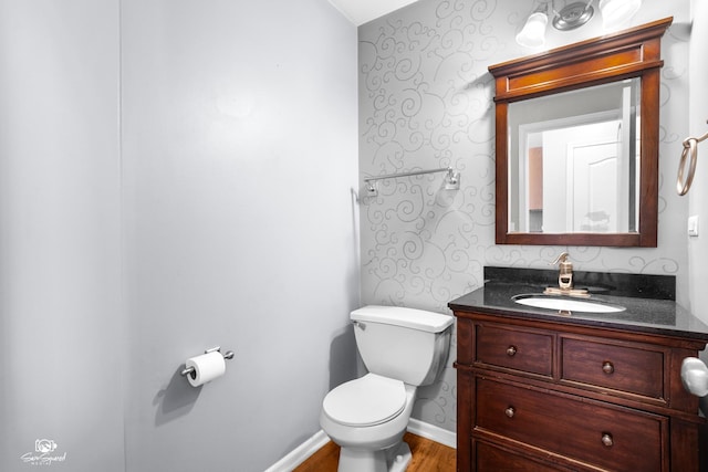 2008 Crosswind Dr, Plainfield, IL 60586 - bathroom with wallpapered walls, vanity, and wood finished floors