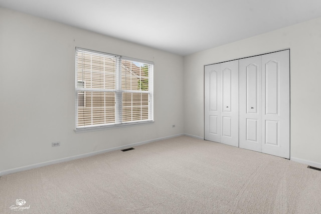 2008 Crosswind Dr, Plainfield, IL 60586 - unfurnished bedroom with carpet and a closet
