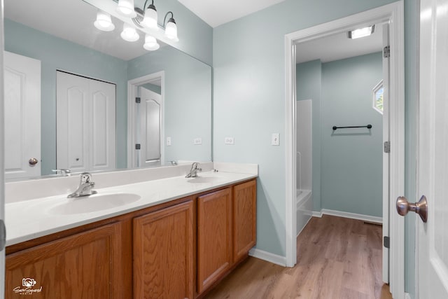 2008 Crosswind Dr, Plainfield, IL 60586 - full bathroom with wood finished floors and double vanity
