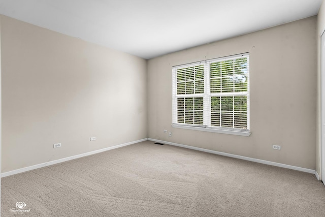 2008 Crosswind Dr, Plainfield, IL 60586 - spare room featuring baseboards and carpet flooring