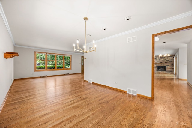 1447 Hillcrest Rd, Downers Grove, IL 60516 - unfurnished room featuring a chandelier, light wood-style floors, a fireplace, and ornamental molding