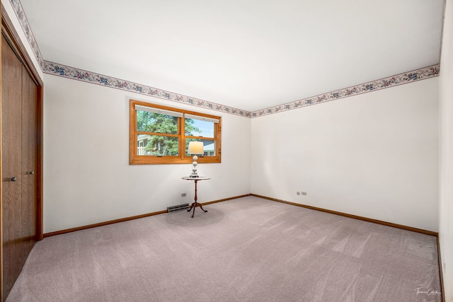 1447 Hillcrest Rd, Downers Grove, IL 60516 - empty room featuring carpet floors and baseboards