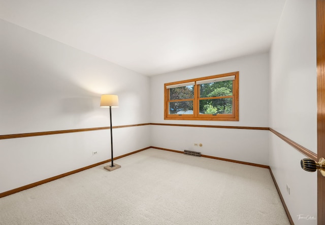1447 Hillcrest Rd, Downers Grove, IL 60516 - empty room featuring light carpet and baseboards