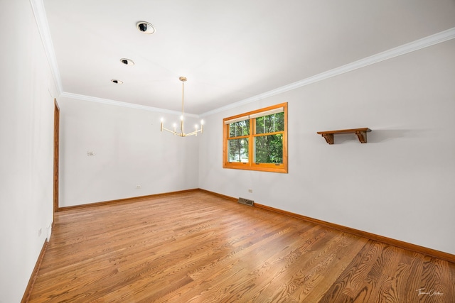 1447 Hillcrest Rd, Downers Grove, IL 60516 - unfurnished room with ornamental molding, a chandelier, and light wood finished floors