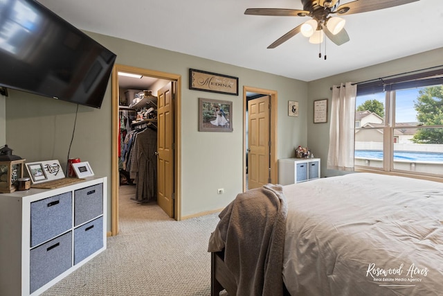 840 Peony Ln, Bourbonnais, IL 60914 - bedroom featuring light colored carpet, a spacious closet, a closet, and a ceiling fan